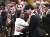  ?? JUSTIN TANG/THE CANADIAN PRESS ?? Prime Minister Justin Trudeau is embraced by Minister of Justice and Attorney General of Canada Jody Wilson-Raybould.