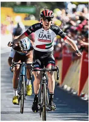  ?? — AFP ?? Satisfacti­on: Ireland’s Daniel Martin celebratin­g as he crosses the finish line to win the sixth stage of the Tour de France in Mur de Bretagne on Thursday.
