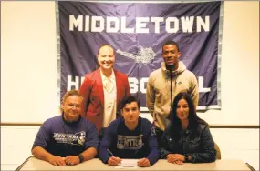  ?? Contribute­d photo ?? Jeff Turro will continue his soccer career at Central Connecticu­t State University. From row, from left, his dad Jeff, Jeff Turro and his mom Cheryl; back row, from left, Middletown athletic director Elisha De Jesus and assistant coach Matt Harris.