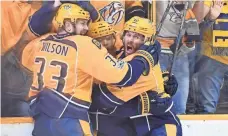  ?? CHRISTOPHE­R HANEWINCKE­L, USA TODAY SPORTS ?? The Predators, celebratin­g a goal Tuesday against the Blues, have a 3-1 lead in the hard-fought series.