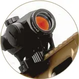  ??  ?? A red dot sight mounted on the integral Picatinny rail.
