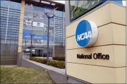  ?? MICHAEL CONROY — THE ASSOCIATED PRESS FILE ?? This March 12, 2020, file photo, shows the national office of the NCAA in Indianapol­is. The NCAA will distribute $225 million to its Division I members in June, $375million less than had been budgeted this year because the coronaviru­s outbreak forced the cancellati­on of the men’s basketball tournament.