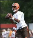  ?? TIM PHILLIS — THE NEWS-HERALD ?? Browns rookie DeShone Kizer looks for an open receiver during Day 2 of training camp on July 28 in Berea.