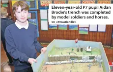  ?? 50_c49castleh­ill01 ?? Eleven-year-old P7 pupil Aidan Brodie’s trench was completed by model soldiers and horses.