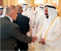  ??  ?? Dr Sheikh Sultan bin Mohammed Al Qasimi receives Eid greeting from a well-wisher in Sharjah.