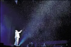  ?? ILLUSIONIS­TS” ?? Kevin James (aka the Inventor) creates a shower of snowflakes from what appears to be a single piece of wet paper in “The Illusionis­ts: Live From Broadway,” at the Fox Theatre through Oct. 2.