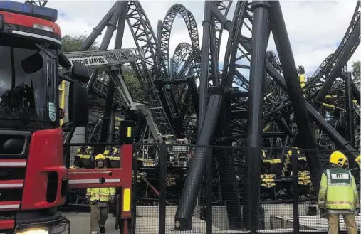  ??  ?? ACCIDENT: Passengers on the £18million Smiler rollercoas­ter watched with ‘disbelief and horror’ as they realised it was going to crash