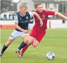  ??  ?? Brora Rangers in action against Dundee.