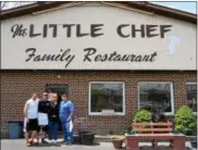  ?? LUCAS RODGERS — DAILY LOCAL NEWS ?? From left, Pete Lymberis, Nick Lymberis, Cindy Fillman and John Lymberis stand outside the Little Chef in Coatesvill­e. Fillman retired on Monay, after working at the Little Chef for about 50years.