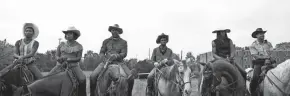  ?? JESSICA KOURKOUNIS/NETFLIX ?? Ivannah-mercedes, from left, Lorraine Toussaint, Idris Elba, Caleb Mclaughlin, Jamil “Mil” Prattis and Cliff “Method Man” Smith in a scene from the Netflix film “Concrete Cowboys.”