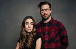  ?? Associated Press ?? Cristin Milioti (left) and Andy Samberg promote their film ‘Palm Springs’ during the Sundance Film Festival in Utah.