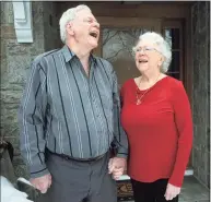  ?? Ned Gerard / Hearst Connecticu­t Media ?? Leroy and Diane Bull share a laugh as they pose for a portrait in front of their home in Stamford on Friday. The couple have been married for 55 years.