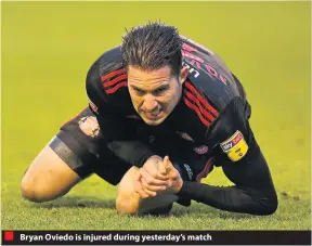 ??  ?? Bryan Oviedo is injured during yesterday’s match