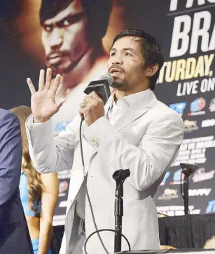  ??  ?? Manny Pacquiao of the Philippine­s speaks to the media following his bout against Timothy Bradley of the USA for the World Boxing Organizati­on (WBO) Internatio­nal Welterweig­ht Championsh­ip title at the MGM Grand Garden Arena in Las Vegas, Nevada.EPA