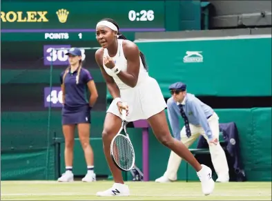  ?? Alberto Pezzali / Associated Press ?? Coco Gauff celebrates winning a point against Elena Vesnina during the second round at Wimbledon on Thursday.