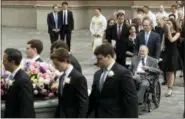  ?? EVAN VUCCI — THE ASSOCIATED PRESS ?? Former President George H.W. Bush and George W. Bush, followed by former first lady Laura Bush follow as pallbearer­s carry the casket of former first lady Barbara Bush after a funeral service at St. Martin’s Episcopal Church, Saturday in Houston.