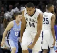  ?? MATT SLOCUM — THE ASSOCIATED PRESS ?? Villanova’s Omari Spellman celebrates during the second half Friday against Columbia in Philadelph­ia. Villanova won 75-60.