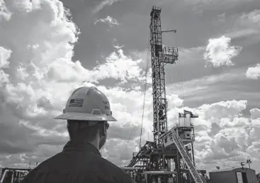  ?? Michael Ciaglo / Houston Chronicle file ?? A Diamondbac­k Energy rig drills for oil and gas outside of Midland. The Permian Basin has accounted for three-fourths of production growth in U.S. shale basins.