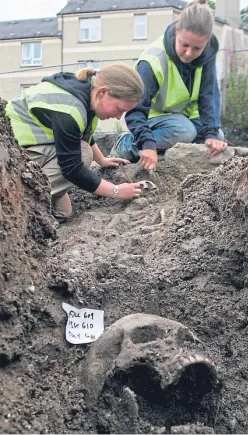 ?? Picture: Steve MacDougall. ?? Archaeolog­ists working at the site of the former Carmelite Friary of Tullilum in Perth.