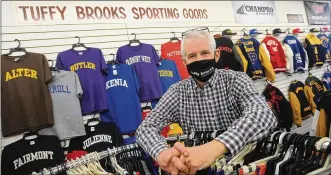  ?? MARSHALL GORBY / STAFF ?? John Napier, co-owner of Tuffy Brooks Sporting Goods in Dayton, said people need to support local businesses and not just the giants of online commerce.