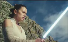  ??  ?? This image released by Lucasfilm shows Daisy Ridley as Rey in “Star Wars: The Last Jedi.”