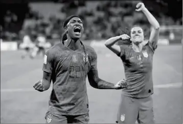  ?? ASSOCIATED PRESS ?? UNITED STATES’ Jessica Mcdonald (left) and Kelley O Hara celebrate after winning the Women’s World Cup semifinal soccer match against England, at the Stade de Lyon outside Lyon, France, Tuesday.