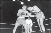  ?? Associated Press ?? n In this June 16, 1949, file photo, Jake LaMotta, left, pounds Marcel Cerdan in the third round of a world middleweig­ht title bout in Detroit. LaMotta won the title by a knockout in the 10th round. LaMotta, whose life was depicted in the film “Raging...