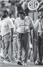  ?? THE ASSOCIATED PRESS ?? LSU coach Ed Orgeron reflects during Saturday’s loss to Troy in Baton Rouge, La.