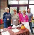  ?? PHOTO PROVIDED. ?? Church members volunteer at a previous Great Fall Festival &amp; Giveaway event.