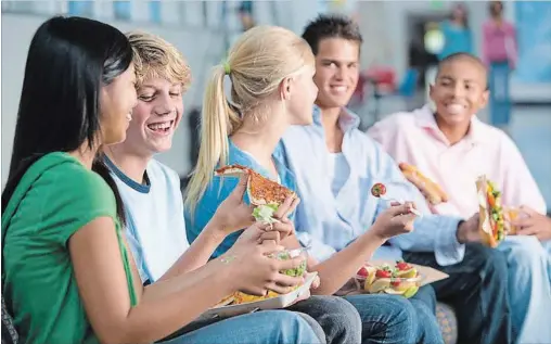  ?? GETTY ?? Adolescenc­e is the most citical time for healthy eating. Limit sugar at home and have healthful snacks available for your busy teen.