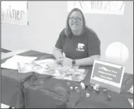  ?? Haley Smith/News-Times ?? Teacher: Yocum Primary kindergart­en teacher Stephanie Williams manned the teacher informatio­n table at the school’s kindergart­en open house.