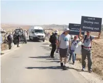  ?? (Combatants For Peace) ?? LEFT-WING protesters are seen in the South Hebron Hills on Friday.