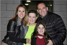  ?? FAMILY PHOTO VIA AP ?? Jake Kestler, center, is shown with his parents, Gallite and Josh, and his sister, Lily, a month before he was diagnosed with brain cancer in 2016. Jake received a geneticall­ymodified virus-based treatment for the cancer when he was 12. “He lived for a year and four months after that,” long enough to celebrate his bar mitzvah, go with his family to Hawaii and see a brother be born, said his father, Josh Kestler, of Livingston, N.J. Jake’s parents started a foundation, Trail Blazers for Kids, to further research.