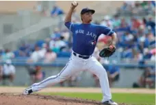  ?? KIM KLEMENT/USA TODAY SPORTS ?? The Jays’ Roberto Osuna, here pitching the ninth against the Yankees on Saturday, is in a battle for the team’s closer job with Drew Storen.