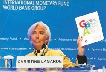  ?? AP ?? ■ Christine Lagarde speaks during a news conference at a World Bank/IMF meeting in Washington yesterday. The IMF listed the trade tensions as a key downside risk to the global recovery.