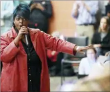  ?? ANGELA WILHELM /THE ASHEVILLE CITIZEN-TIMES VIA AP ?? DeLores Venable addresses Asheville Police Chief Tammy Hooper Wednesday during the Asheville Citizens Police Action Committee meeting at the Dr. Wesley Grant Sr. Southside Center in Asheville, N.C.