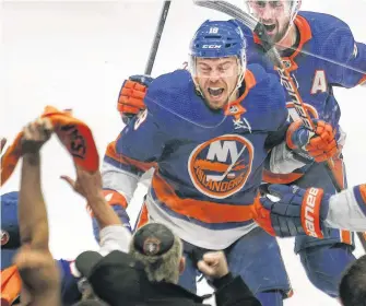  ?? USA TODAY ?? New York Islanders left winger Anthony Beauvillie­r reacts after scoring the game-winning goal in overtime against the Tampa Bay Lightning in Game 6 of the 2021 Stanley Cup semifinal at Nassau Veterans Memorial Coliseum in Uniondale, N.Y., Wednesday night.