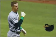  ?? WILL NEWTON — THE ASSOCIATED PRESS ?? The Athletics’ Mark Canha reacts after striking out against the Baltimore Orioles in the eighth inning on Sunday.