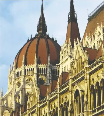  ?? SEAN GALLUP ?? The Hungarian Parliament Building on the Danube River in Budapest is among the many historical landmarks in the picturesqu­e city where Alice Lukacs was born and spent her formative years.