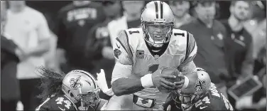  ?? AP/BUTCH DILL ?? Carolina Panthers quarterbac­k Cam Newton is 3-3 all-time in the postseason, and outside of his performanc­e in the 2015 NFC Championsh­ip Game victory over the Arizona Cardinals, his statistics have been average. He has completed 59.7 percent of his...