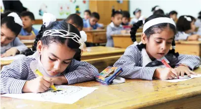  ??  ?? Palestinia­n children in their classroom at a school run by the UN Relief and Works Agency for Palestine Refugees in Gaza in this file photo. (Courtesy UN photo)