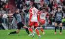  ?? Boris Streubel/Getty Images ?? Kingsley Coman scores Bayern Munich’s third goal against Freiburg. Photograph: