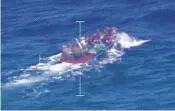  ?? U.S. COAST GUARD/COURTESY ?? A tug boat with 37 Cubans was on its way to Florida when it was intercepte­d by the U.S. Coast Guard.