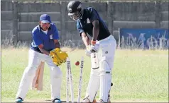  ?? Picture: ANDRE ROCHE ?? OUT: Lamyeni Hard batsman Mongezi Nabe gets castled by Andile Caga (not in picture) during the final of the Ray Mali T20 match