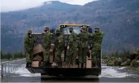  ?? British Columbia. Photograph: Reuters ?? Members of the Canadian armed forces take part in emergency efforts in Abbotsford,