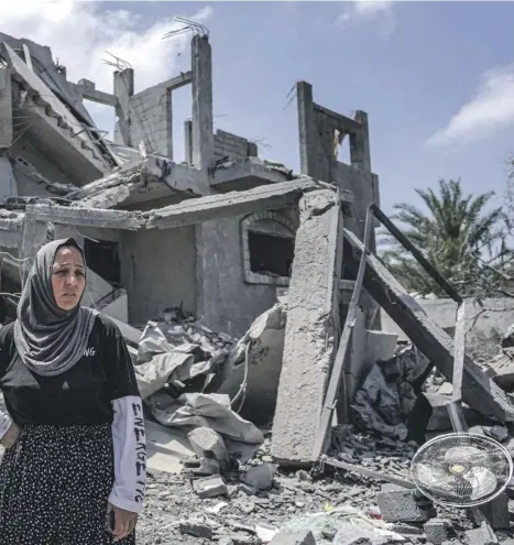  ?? PHOTOGRAPH: AFP/GETTY ?? Despair amid the destructio­n: a woman in the Maghazi refugee camp, central Gaza, yesterday