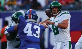  ?? ?? The Jets’ Aaron Rodgers, right, went 5 for 8 for 47 yards and a touchdown in his two series before being replaced by Zach Wilson on Saturday night. Photograph: Ed Mulholland/USA Today Sports