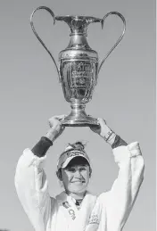  ?? THOMAS SHEA USA TODAY NETWORK ?? Nelly Korda poses with the trophy after winning The Chevron Championsh­ip on Sunday in The Woodlands, Texas.