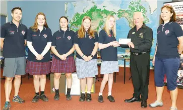  ??  ?? Drouin Secondary College Leos Club also donated to Need for Feed drought relief. Pictured from left Bernie Walsh, Caitlyn Warriner, Halle Braybon, Ruby Kelly, Jess PowellCava­lar, Graeme Cockrill from Need for Feed charity and Gita Walker.