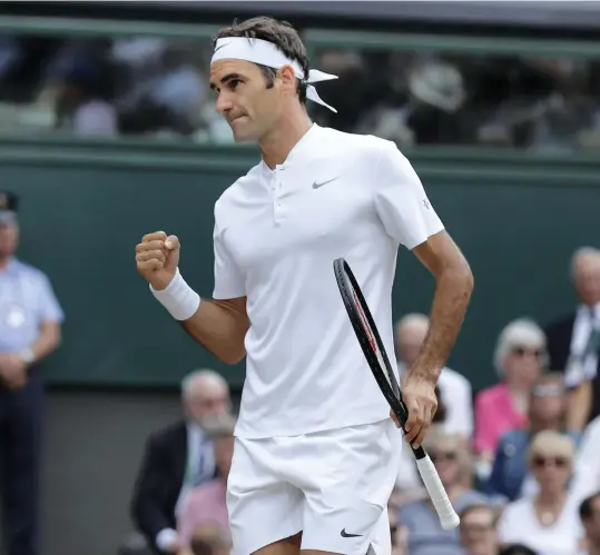  ?? Reuters ?? This year has been a good one for Roger Federer with a surprise title win at Australian Open, below, before he added Wimbledon as his 19th major crown